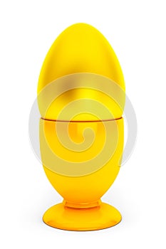 Golden egg in yellow eggcup