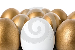 Golden eggs with different one