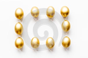 Golden eggs frame. Wealth and good luck concept. Easter decoration