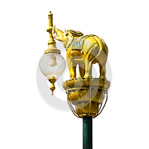 Golden elephants on street lamp post isolate photo