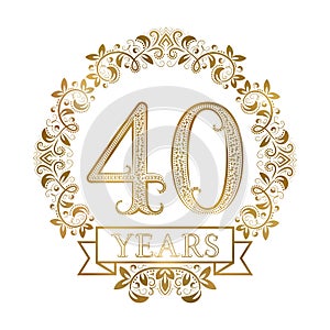 Golden emblem of fortieth years anniversary in vintage style