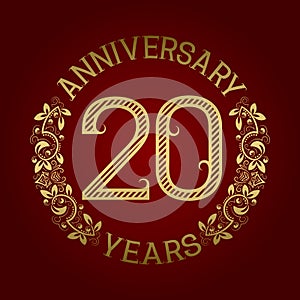 Golden emblem of twentieth anniversary. Celebration patterned sign on red