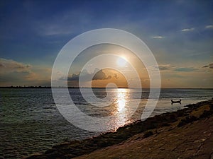 Golden evening in the moment of sunset in front of Padma river