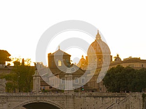 Golden evening sun rays illuminate the historic Sistine chapel in Vatican City.