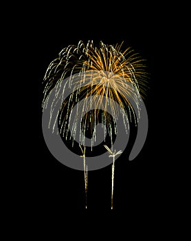 Golden exploded fireworks isolated on black background