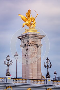 Golden fame Sculpture and lamps in Pont Alexandre III, Paris, france
