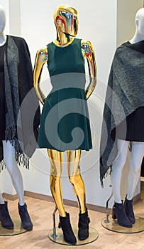 Golden fashion mannequin with dress france