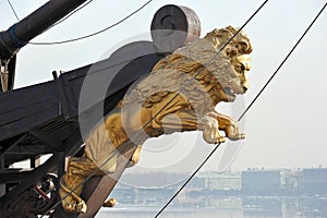 A Golden figure of a lion on the bow