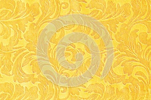 Golden floral ornament brocade textile pattern