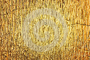 Golden foil abstract textured background.