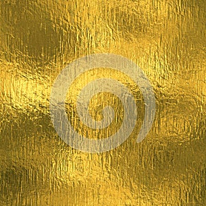 Golden Foil Seamless and Tileable luxury background texture. Glittering holiday wrinkled gold background.