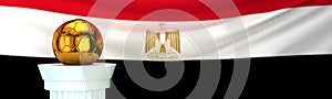 Golden football soccer ball in front of Egypt flag