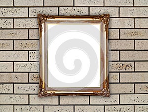 Golden frame on brick stone wall