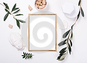 Golden frame mock-up on white tabletop