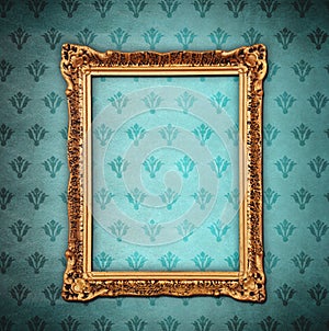 Golden frame over grunge wallpaper