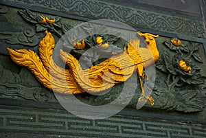 Golden Frieze the peacock. Tua Pek Kong Chinese Temple. Bintulu city, Borneo, Sarawak, Malaysia