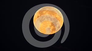 Golden full-moon during the penumbral lunar eclipse