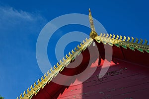 Golden gable on the roof temple architecture of northern thailand