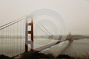 Golden Gate Bridge with fog and overcast weather from scenic viewpoint