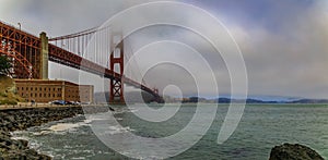 Golden Gate bridge with low fog rolling in San Francisco, California