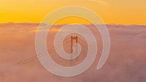 Golden Gate Bridge with low fog in USA