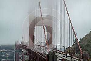 Golden Gate Bridge north tower in the fog, San Francisco, CA, USA