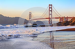 Golden Gate Bridge in San Francisco from Baker Beach at sunset