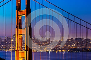 Golden Gate Bridge San Francisco sunset through cables