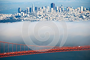 Golden Gate bridge span and cables on foggy day view from Marin