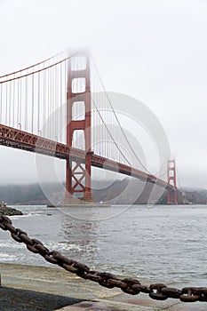 Golden Gate at dawn surrounded by fog, San Francisco USA