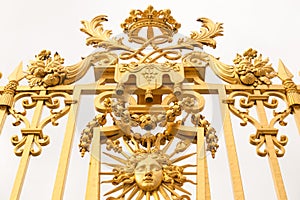 The golden gate of the Palace of Versailles, or Chateau de Versailles, or simply Versailles, in France