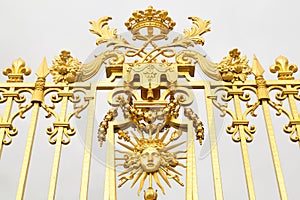 The golden gate of the Palace of Versailles, or Chateau de Versailles, or simply Versailles, in France