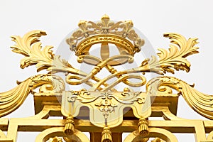 The golden gate of the Palace of Versailles, or Chateau de Versailles, or simply Versailles, in France