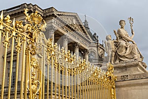 The golden gate of the Palace of Versailles, or Chateau de Versailles, or simply Versailles, in France