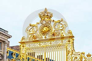 The golden gate of the Palace of Versailles in France