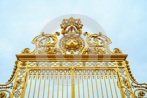 The golden gate of the Palace of Versailles in France