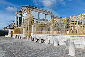 Golden gate of Palace Versailles near Paris, France