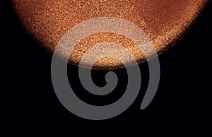 Golden gel on black background