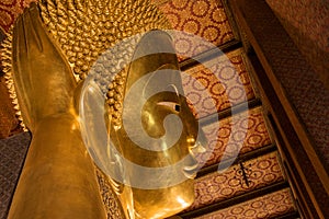 The Golden Giant Reclining Buddha (Sleep Buddha) in Wat Pho Temple, Bangkok, Thailand