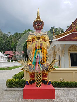 Golden giant statue in the Buddhism temple