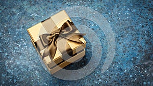 Golden gift box with shiny brown satin bow