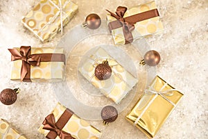 Golden gift boxes and Christmas decorations photo