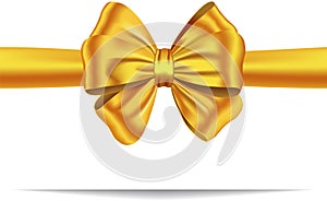 Golden gift ribbon with bow photo