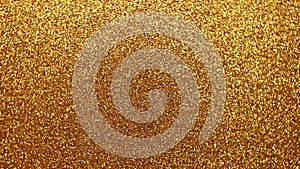 Golden glitter background with sparkling texture. Moving fast in a circle