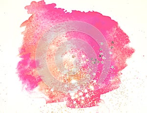 Golden glitter and glittering stars on abstract pink watercolor splash in vintage nostalgic colors