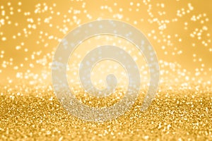 Golden glitter party background or gold champaign color gliter sparkel Christmass backround