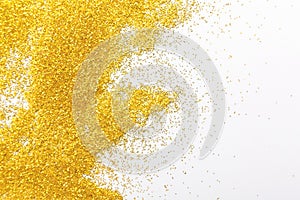 Golden glitter sand texture, abstract background.