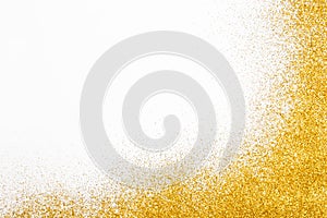 Golden glitter sand texture frame on white, abstract background.