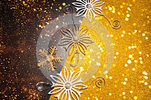 Golden glitter sparkling Christmas abstract background. Festive concept. Bokeh background