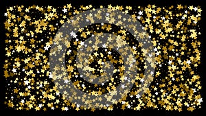 Golden glitter star confetti on a black background